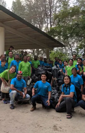 A group of volunteers together after a community activity